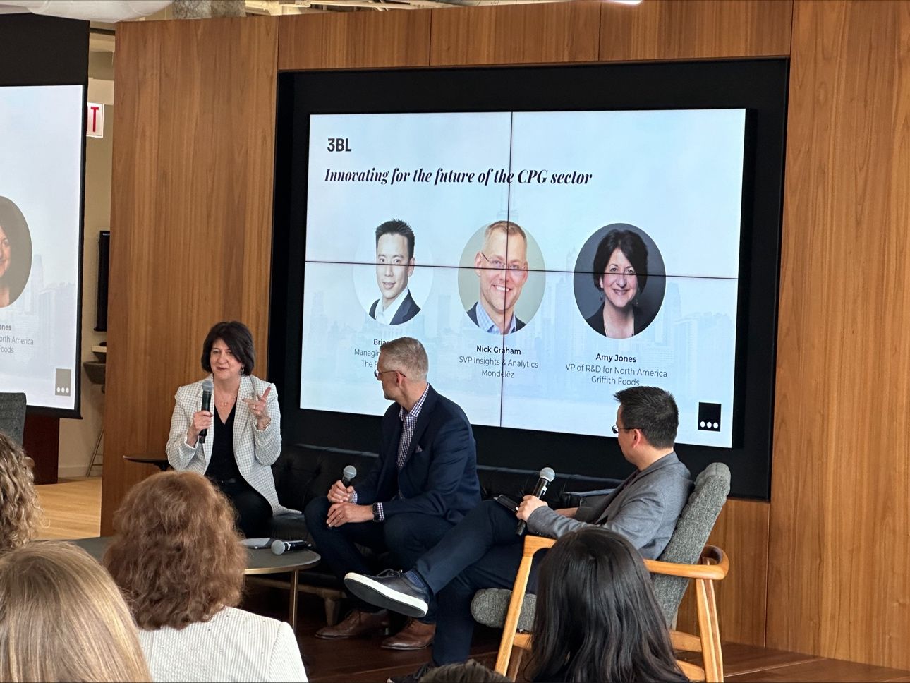a woman and two men speak in panel session at at Mondelēz International’s headquarters in Chicago